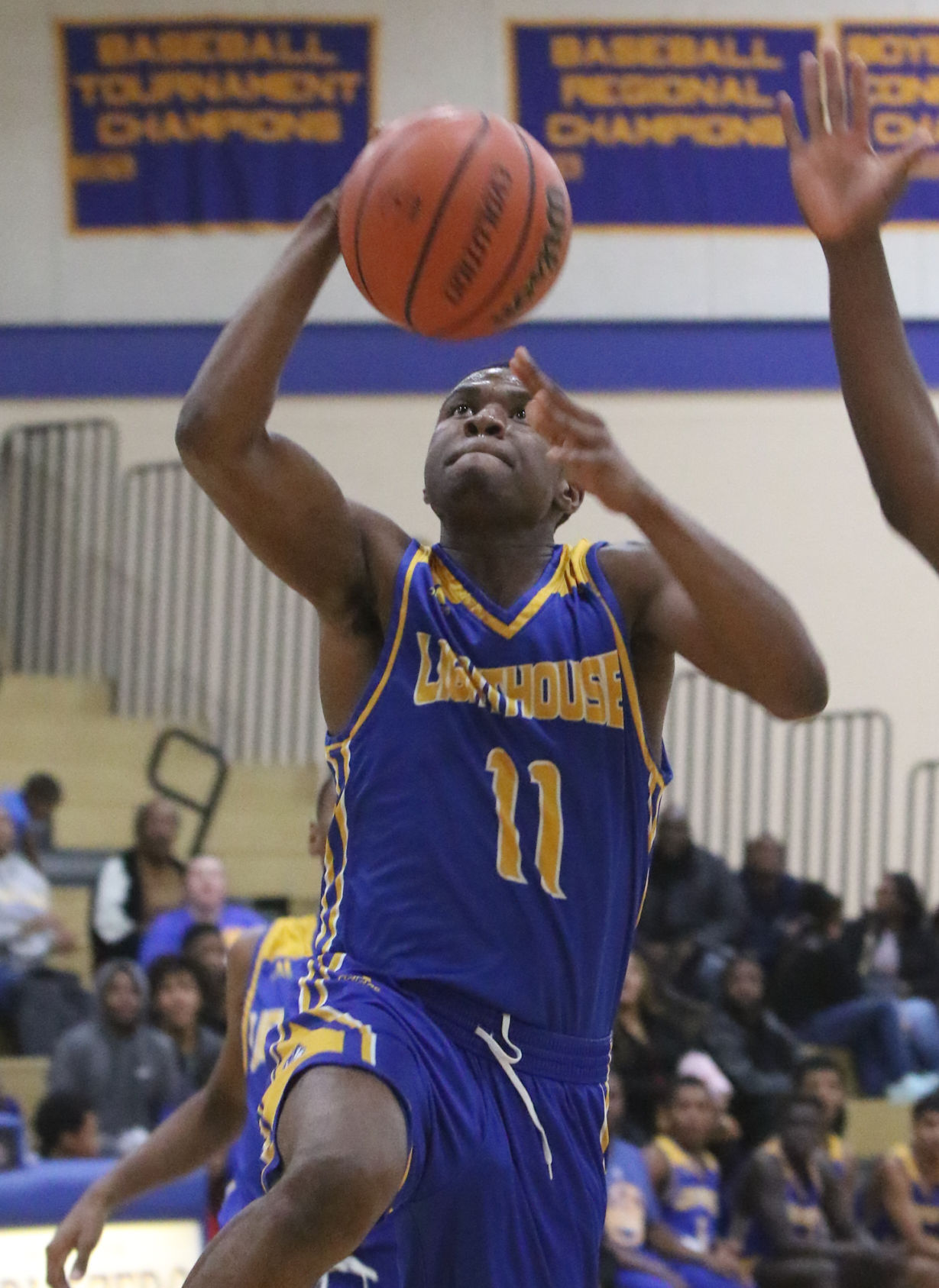 Lighthouse at Marquette Catholic boys basketball
